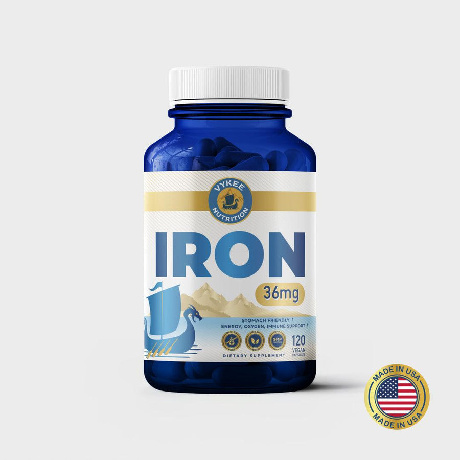 Vykee Iron Capsules bottle, navy with a gold label band